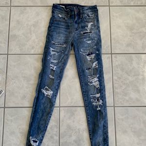 AMERICAN EAGLE SKINNY JEANS (DARK WASH)